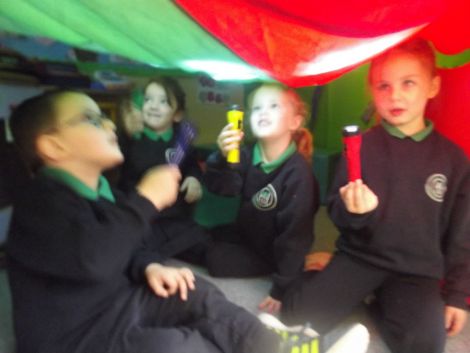 Investigating light and dark in our tent!