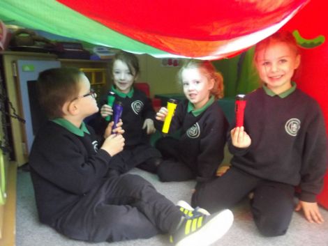 Investigating light and dark in our tent!