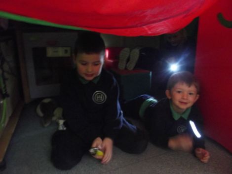 Investigating light and dark in our tent!
