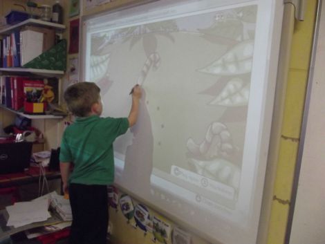 Number games on the Interactive Whiteboard.