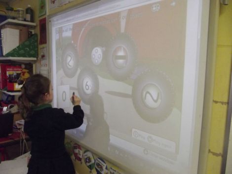 Number games on the Interactive Whiteboard.